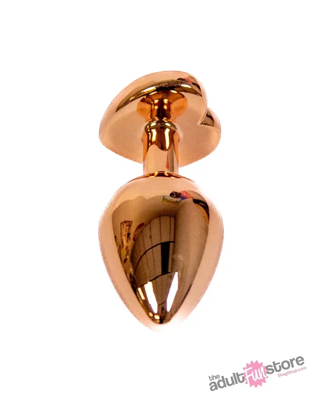 ns-novelties-rear-assets-aluminum-heart-butt-plug-rose-gold-clear-3-25-inch