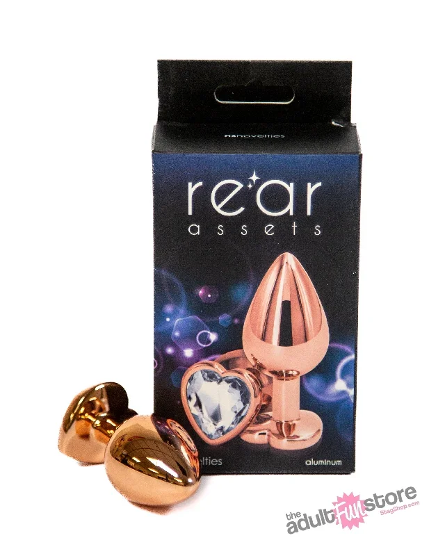 ns-novelties-rear-assets-aluminum-heart-butt-plug-rose-gold-clear-3-25-inch